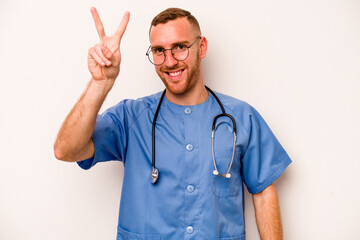 Young caucasian nurse man isolated on white background showing number two with fingers.