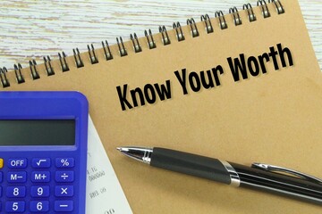 pen, calculator, notebook with the words Know your worth