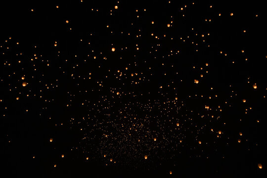 Dark Sky With Many Floating Orange Lanterns