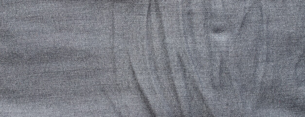 texture of gray jeans denim fabric background