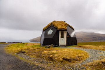 A modern turf igloo near the small village of Kvivik on the island of Streymoy. Faroe Islands. - obrazy, fototapety, plakaty