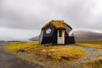 Fotobehang A modern turf igloo near the small village of Kvivik on the island of Streymoy. Faroe Islands. © Tomasz Wozniak