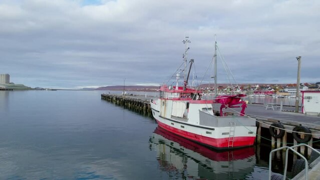 Aerial shot of a fishingboat in Vads&oslash;, Norway