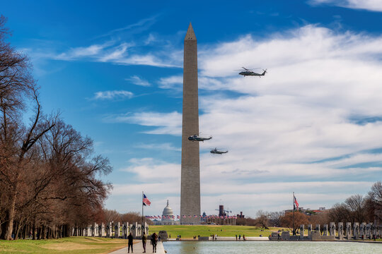 Helicopters in flight at the Washington Monument with US President, Washington, DC, USA