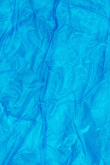 Blue wrinkled material textured background