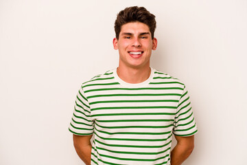 Fototapeta premium Young caucasian man isolated on white background happy, smiling and cheerful.