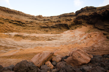 Cliff and rocks. Caleton Oscuro. Montana Clara. Integral Natural Reserve of Los Islotes. Canary Islands. Spain.