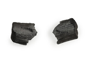 Black oak coal isolated on white background.