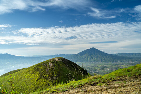 View of Indonesia's mountains with wide green grass