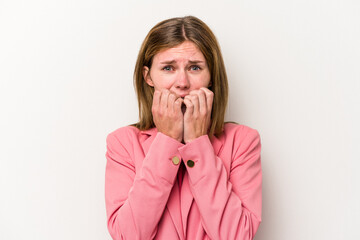 Young russian woman isolated on white background biting fingernails, nervous and very anxious.
