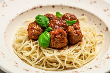 Spaghetti pasta with meatballs and tomato sauce, Italian Food recipe background. Close up