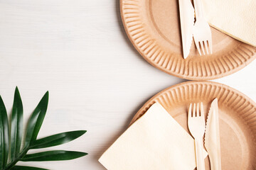 Fototapeta na wymiar eco tableware made of bamboo wood, disposable organic kitchen utensils, reusable use, recyclable waste