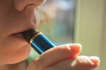 vaper smokes vape, smoke from electronic cigarettes, harm to health