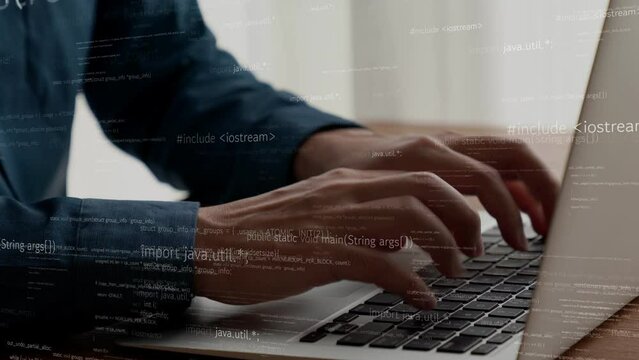Computer programmer uses capable laptop computer to develop programming code of new software . Computer specialist working on future coding application for software programming development .