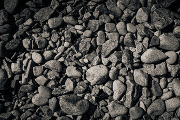 Rocks and stones on the beach in Normandy, France.