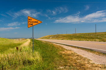 Road with "No Passing Zone" sign