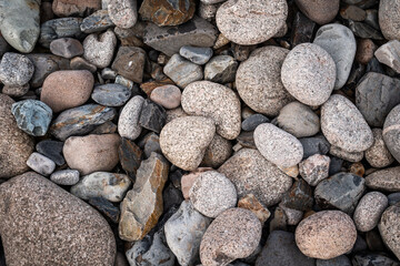 Rocks and stones on the beach in Normandy, France.