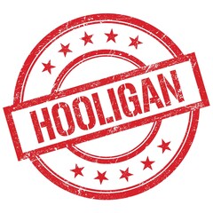 HOOLIGAN text written on red vintage stamp.