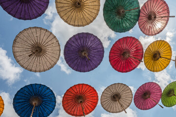Paper Umbrella alley with blue sky in the background.