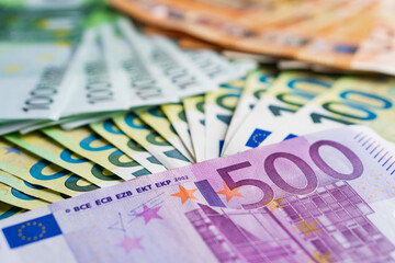Obraz premium Lot of paper banknotes five hundred one hundred and fifty euro. Top view. Pile of money. Close-up