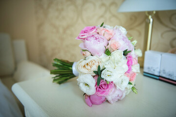 Bouquet for the bride, which is on the table