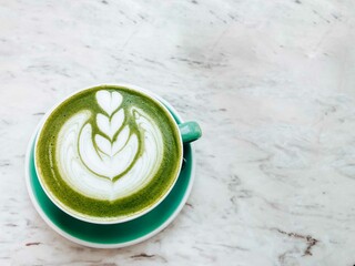 Matcha latte in the cup