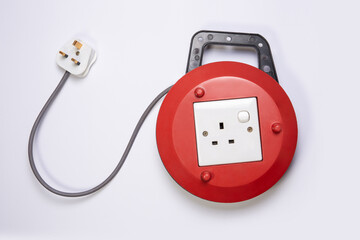 Extension wire with socket wrapped in a red drum