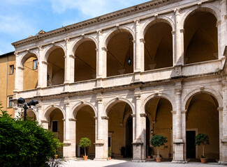Fototapeta na wymiar Internal courtyard and cloisters of Venice Palace - Palazzo di Venezia - formerly Palace of St. Mark at Venice Square Piazza Venezia in historic center of Rome in Italy