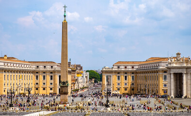 Fototapeta na wymiar St. Peter square, Piazza San Pietro, with ancient column Egyptian obelisk and circular Doric colonnade in Vatican city district of Rome in Italy