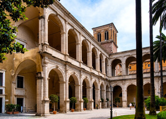 Fototapeta premium Internal courtyard and cloisters of Venice Palace - Palazzo di Venezia - formerly Palace of St. Mark at Venice Square Piazza Venezia in historic center of Rome in Italy
