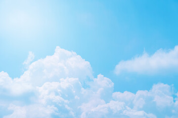 Naklejka na ściany i meble Beautiful blue sky background with cloudy in sunshine.