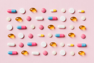 Many different pills and space for text on colorful background, top view. Different pills on color...