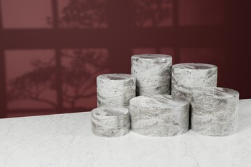 Cosmetic background for product presentation and fashion magazine. white marble podium on dark red wall scene with shadow of trees and windows. Minimal geometric shape. 3d rendering illustration.