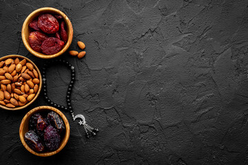 Ramadan Kareem background. Dates fruits and rosary with star and crescent