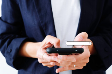 close up of businesswoman working with mobile phone