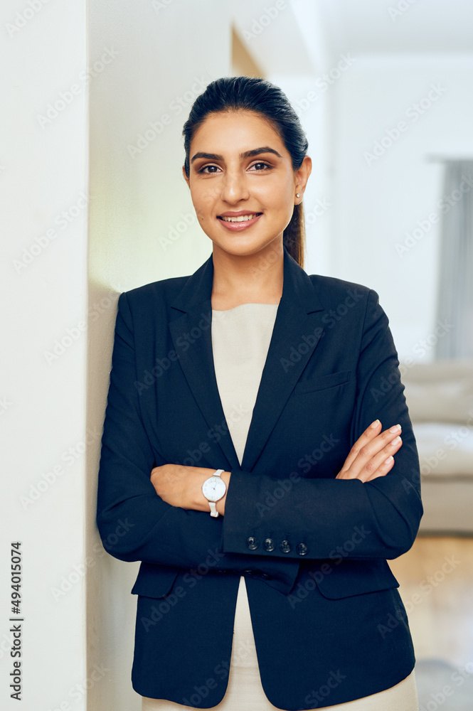 Sticker Confidence leads to success. Portrait of a young woman standing in an office.