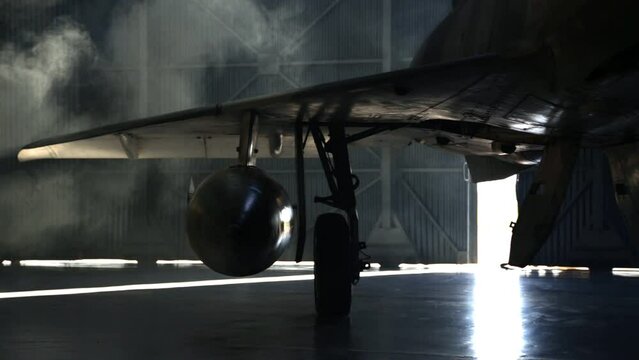 Opening the Door of Aircraft Hangar where a Fighter Jet is Kept, Warplane inside Hangar.