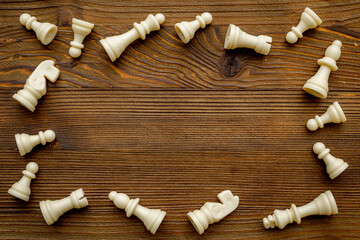 Flatlay of chess pieces, top view. Chess game as victory concept
