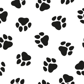 Seamless pattern with black paws
