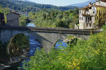Fototapeta premium Santa Lucia bridge over the Serchio river in Castelnuovo Garfagnana; Tuscany, Italy