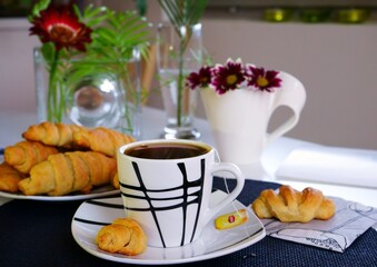 breakfast with coffee and croissant