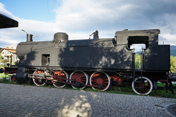 Fototapeta na wymiar Old steam locomotive at Piazza al Serchio, Tuscany, Italy