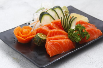 Freshly prepared Japanese food called Salmon Sashimi