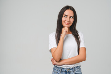 Dreamy pensive thoughtful caucasian young woman girl student freelancer thinking about startup,...