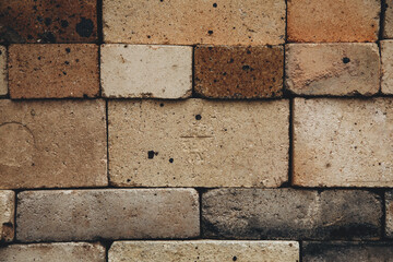 Background of old textured bricks of different shades. Background, texture