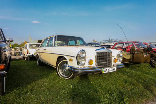 KYIV, UKRAINE-MAY 7, 2021: Full-size white luxury car Mercedes-Benz 280SE (W111), 1966. A classic car in a public exhibition in Kyiv, Ukraine. 