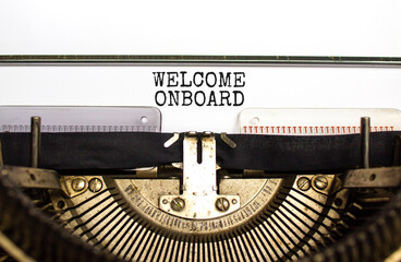 Welcome onboard and support symbol. Concept words Welcome onboard on white paper typed on retro typewriter. Beautiful white background. Copy space. Business and Welcome onboard concept.