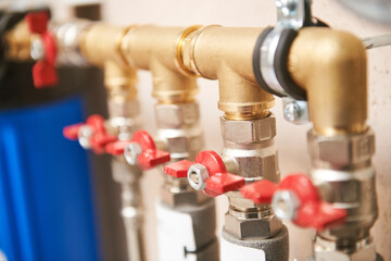Plumbing service. pipes connection with valves of a heating system in boiler room