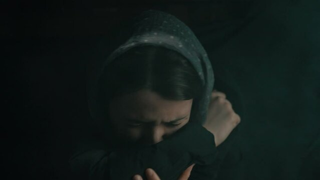 Woman suffocating from the smoke in the basement