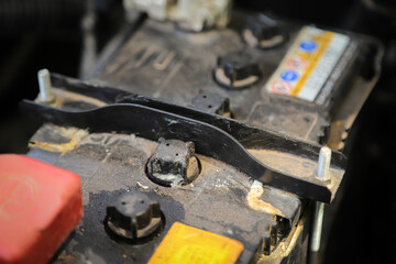 old car battery with rusty wet stain from long using car in daily life activity. repairing idea...